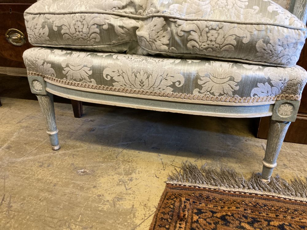 A Louis XV style grey and cream painted carved wood fauteuil, width 75cm, height 86cm